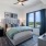 Atlanta, GA Apartments - Mira At Midtown Union - Spacious Bedroom With Plus Carpet Flooring, Large Windows For Views, 10-12 Foot Ceilings, And Ceiling Fan