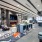 1-Bedroom Apartments In Atlanta, GA - Mira At Midtown Union - Clubroom With Lounge Seating, Bar Area, Chairs, A Fireplace, And TV.