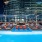 Two-BR Apartments In Atlanta, GA - Mira At Midtown Union - Rooftop Pool With Skyline In Background, Lounge Chairs, And Cabana